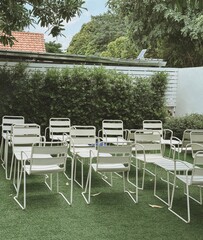 chairs and tables in a garden