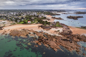 Aerial view of the coastline scenery and seaside village along the Pink Granite Coast, Brittany, France