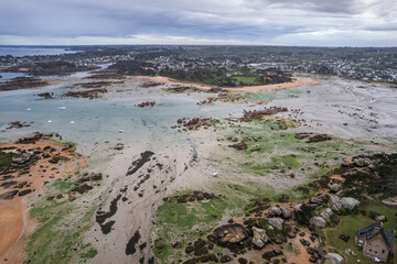 Aerial view of the coastline scenery and seaside village along the Pink Granite Coast, Brittany, France