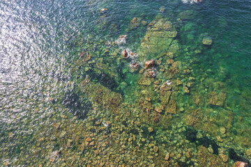 Natural landscape of the rocky beach and seascape along the Brittany coastline, Côte de granite rose or Pink Granite Coast in France