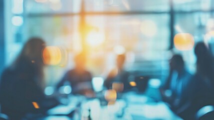 blurred group of diverse professionals engaged in a collaborative meeting. representing teamwork, diversity, and collective brainstorming in a modern business