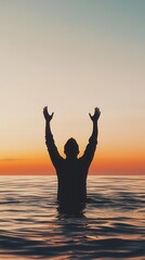 Person standing in the ocean with hands raised in prayer, light from the horizon symbolizing waves of grace