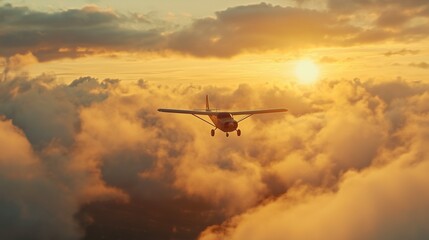 Fototapeta premium A crop duster plane flies through the clouds in the rays of the setting sun