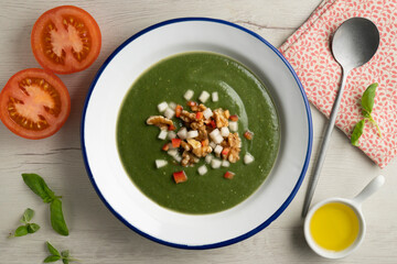 Spinach cream made with pear, vegetables and walnuts. Top view table with  decorations.