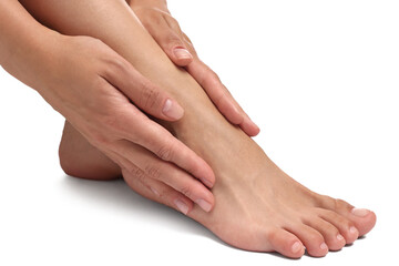 Woman touching her smooth feet on white background, closeup