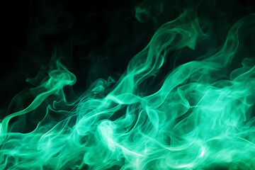 Obraz premium Ethereal green smoke swirls gracefully against a dark background, creating a mystical atmosphere.
