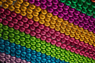 background of colorful stripes made of Christmas decorative balls