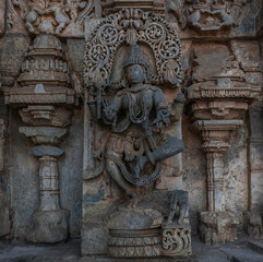 Intricate carvings and sculptures of the Hoysala temples in Belur, India.