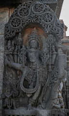 Intricate carvings and sculptures of the Hoysala temples in Belur, India.