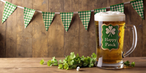 Frothy beer mug sits on a wooden table adorned with shamrock decorations,while green and white bunting hangs in the background.Fresh shamrock clippings add a festive touch to the rustic setup.AI gener