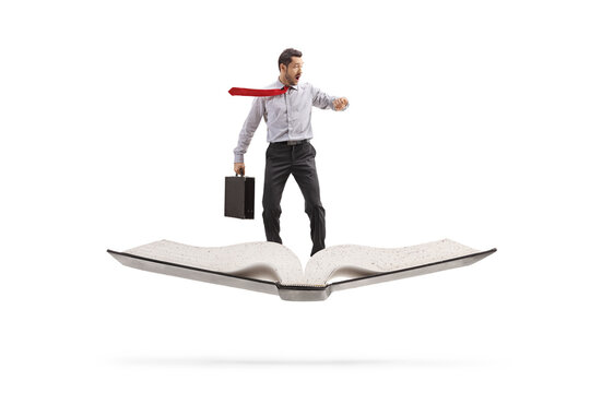 Full length shot of a businessman flying on a book
