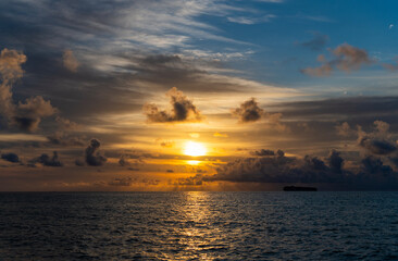 Obraz premium Dramatic horizon sea view on sunset. Romantic summer vacation at seascape. Dramatic sunrise. Sea sunrise summer beach. Sunset seascape at summer vacation. Sunrise with sea beach. Sunset over the ocea