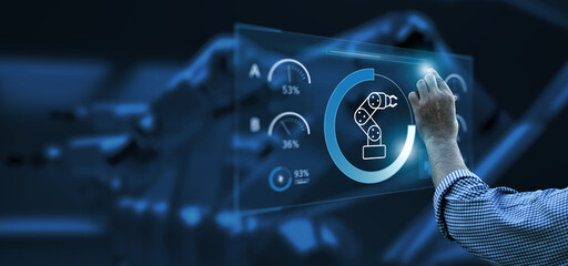 Engineer hand monitoring robotic AI arms in manufacturing factory plant, manager managing controlling using computer holographic ui display analysis technology, engineer, dark banner background.