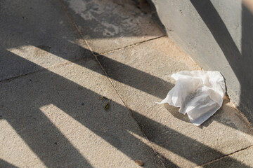 Crumpled Paper on Concrete with Shadows