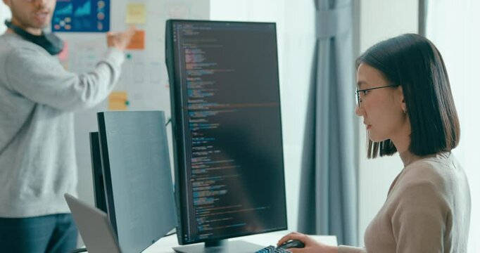 Group adult Asia male female software developers mentor leader manager talk strategy plan to executive write prompt AI bot IT app program nomad, video game, data center. Whiteboard slideshow code.