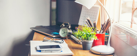 Diary and book on School table for student,study for exam.Wooden desk with desktop...