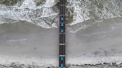 Aerial view of sunrise at Jacksonville Beach pier in Jacksonville Beach Florida USA