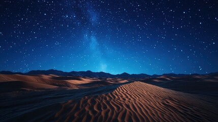 Fototapeta premium A serene desert landscape illuminated by a starry night sky, featuring rolling dunes and a glowing horizon.