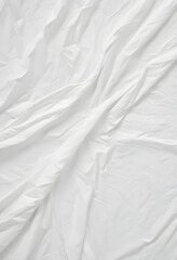 Fototapeta premium Close-up of white fabric with natural wrinkles and folds, creating a textured and minimalistic background suitable for various design uses. 