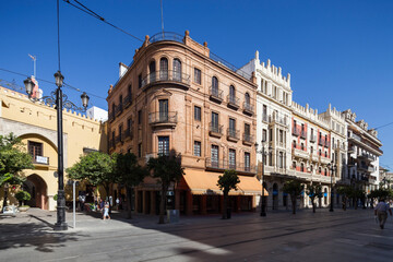 Obraz premium Seville, Spain, Sep 30 2009, Seville Tourist Office & Seguros Santa Lucia on Avenida Constitución