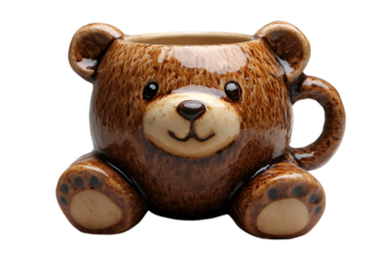 a brown mug shaped like a bear. 