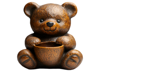 a brown teddy bear holding a cup. 
