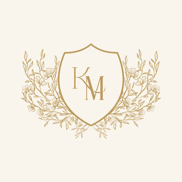 Elegant classical wedding floral crest with KM initial letter. Can be used in invitations card, business logo, personal logo. vector illustration