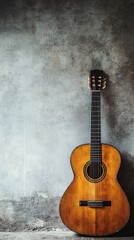Obraz premium A beautifully crafted classical guitar leaning against a wall, with ample copy space for text or branding on a minimalistic background