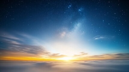 Starry night sky, low horizon, clouds blending with darkness.