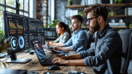 A team of developers working on AI algorithms, with computer screens displaying code and data visualizations