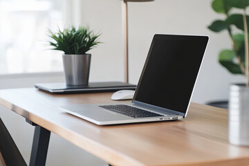 Minimalist office with a clean desk, laptop, and simple decor
