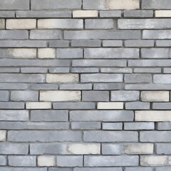 Fototapeta premium close-up view of a brick wall. The wall is constructed with rectangular bricks that have a weathered and rustic appearance.