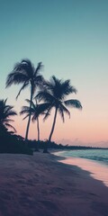 Obraz premium Tropical beach at dusk with palm trees swaying gently by the shore