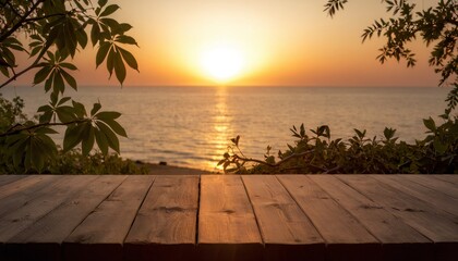 Photo of a wooden table with a view of the ocean and sunset
