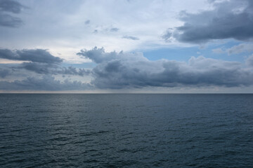 Obraz premium Seascape with stormy clouds over the sea. Nature composition.