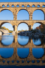 The Pont du Gard. Ancient Roman aqueduct bridge over Gardon river. Vertical photography taken in France