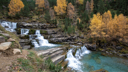 Beautiful waterfall on the Arazas river in the Ordesa y Monte Perdido National Park in the Pyrenees, Huesca, Aragon, Spain © AntonioLopez