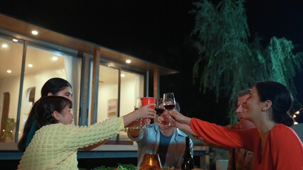 Family together for holiday celebration. Adult member hold grape wine in glass except daughter. Outdoor camping activity relax with food and spend time with relatives cross generation gap. Divergence.