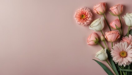 A pink and white flower arrangement is placed on a pink background