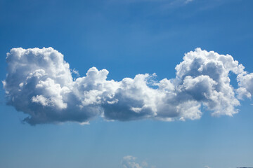 White cumulus fancy cloud on blue sky, from the series Clouds