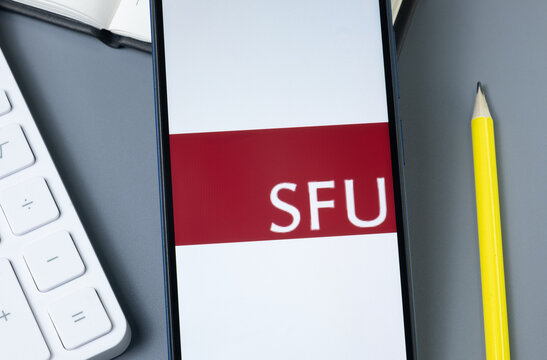 New York, USA - 30 August 2024: Simon Fraser University SFU Logo on Phone Screen, Company Icon on Display