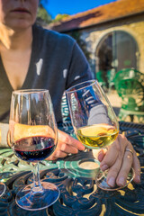 port wine testing, glasses with drink woman holding one