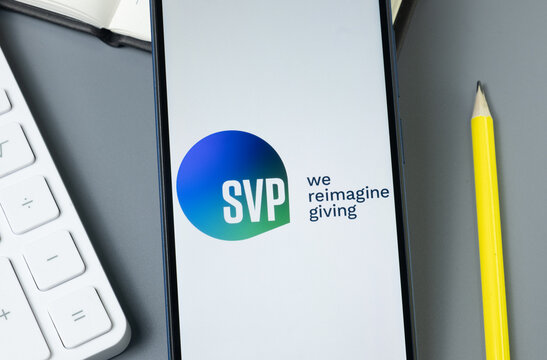 New York, USA - 30 August 2024: SVP International Logo on Phone Screen, Company Icon on Display