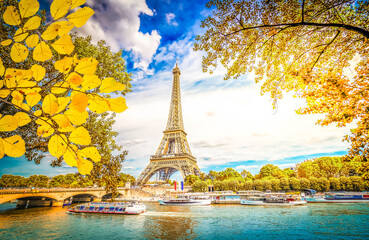 Paris famous landmarks. Eiffel Tower iwith green tree over river, Paris France, toned