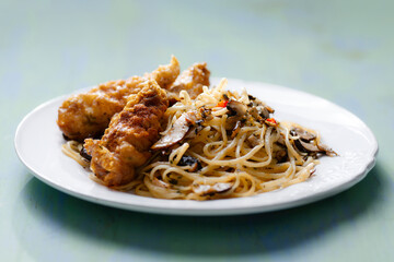 aglio olio pasta with battered fish