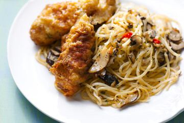 aglio olio pasta with battered fish