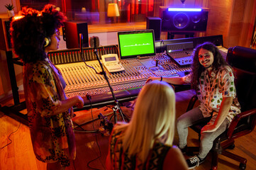 Screen on a mixing board in a music studio during an album recording