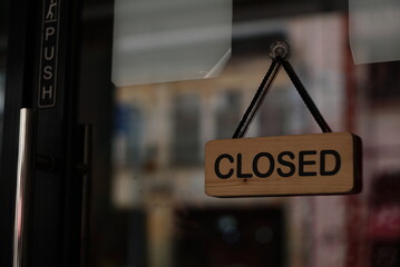 Business center closed in door window. Stores, restaurants, offices, other public places...