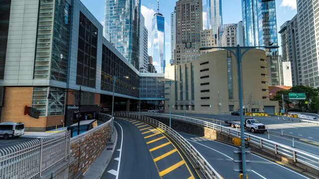 New York City - USA - Aug 13 2024: Triborough bridge and tunnel entrance with Lower Manhattan skyline in the sunny afternoon