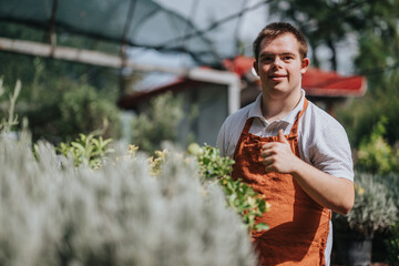 A young gardener with Down syndrome smiles confidently while tending plants in a lush greenhouse....